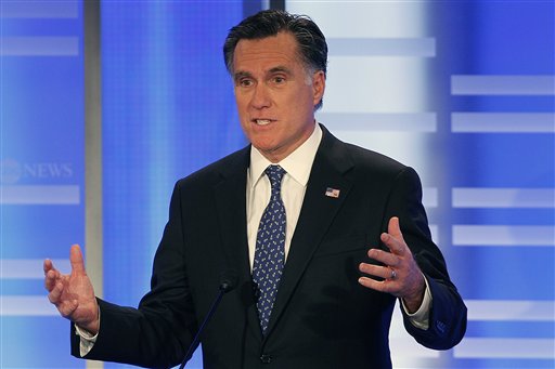 Former Massachusetts Gov. Mitt Romney answers a question during a Republican presidential candidate debate at Saint Anselm College in Manchester, N.H., Saturday, Jan. 7, 2012. (AP Photo/Elise Amendola) (AP)