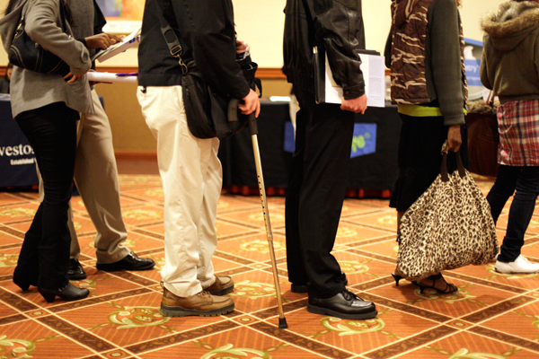 Job seekers stand in line at a Career Fair in San Francisco on Jan. 18, 2012. (AP/Eric Risberg)