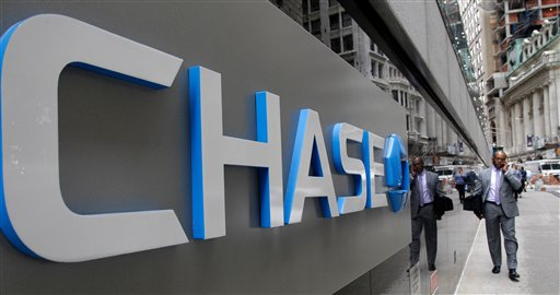 This Oct. 12, 2011 file photo shows the J.P. Morgan Chase logo at the base of one of the bank's larger Lower Manhattan buildings in New York (AP Photo/Kathy Willens)
