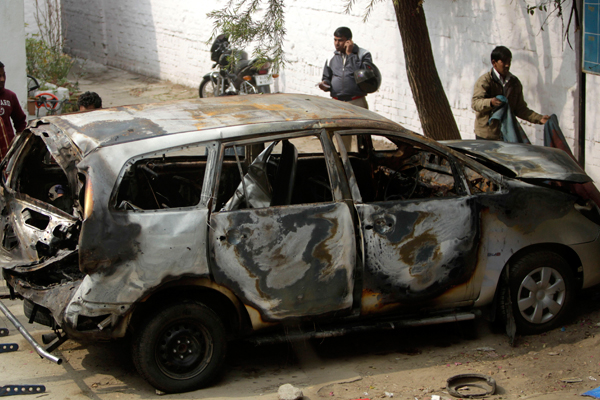 Israeli diplomat's car damaged in an explosion in India.. (AP/Mustafa Quraishi)