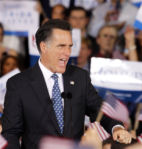 Republican presidential candidate, former Massachusetts Gov. Mitt Romney, reacts to supporters at his Florida primary primary night rally in Tampa, Fla., Tuesday, Jan. 31, 2012. (AP Photo/Gerald Herbert) (AP)