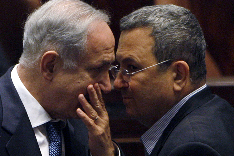Israeli Prime Minister Benjamin Netanyahu speaks with Defense Minister Ehud Barak (Ronen Zvulun / Reuters)