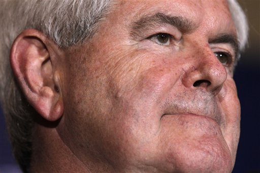 Republican presidential candidate former House Speaker Newt Gingrich pauses as he speaks during a Florida Republican presidential primary night rally, Tuesday, Jan. 31, 2012, in Orlando, Fla. (AP Photo/Matt Rourke) (AP)