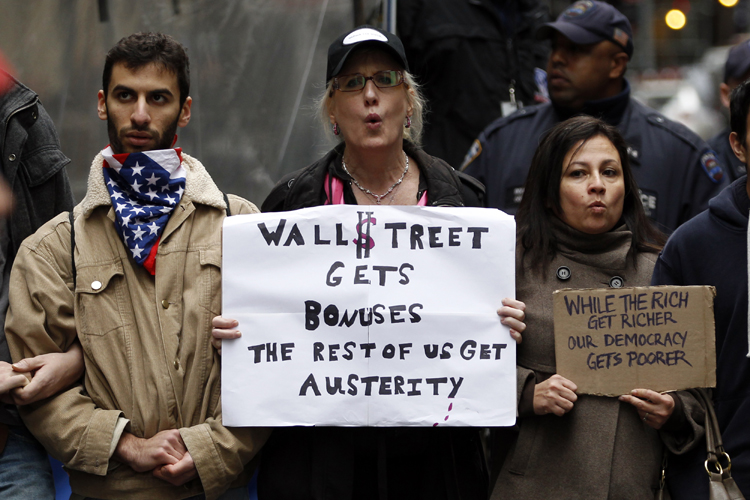 Occupy Wall street demonstrators near the New York Stock Exchange during what organizers called a "Day of Action" in New York, November 17, 2011. (Mike Segar / Reuters)