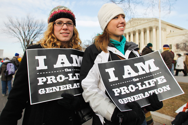 Anti-abortion activists march in front of the Supreme Court in Washington, Monday, Jan. 24, 2011 (AP/Manuel Balce Ceneta)