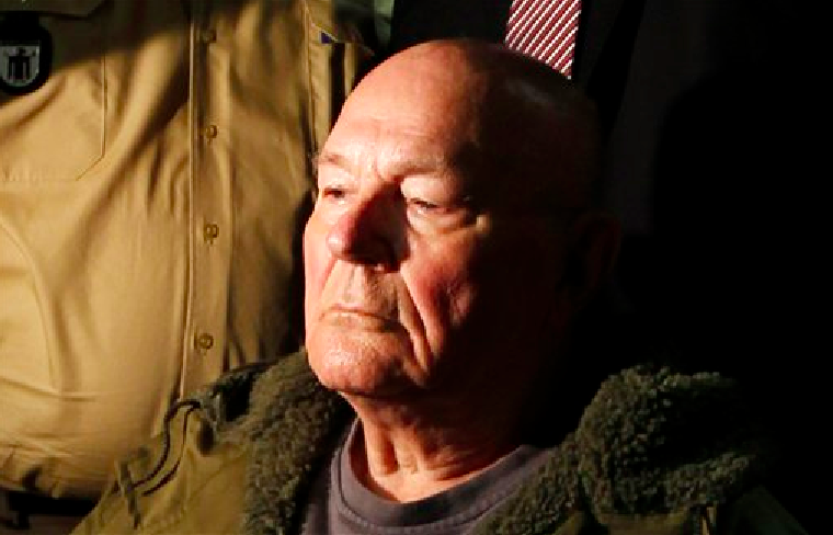 John Demjanjuk waits in a courtroom in Munich. He was charged with 28,060 counts of accessory to murder and convicted of serving as a Nazi death camp guard. (AP Photo/Matthias Schrader)