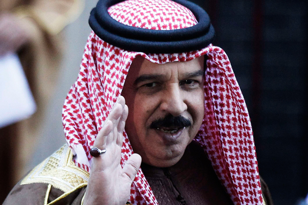 Bahrain's King Hamad bin Isa al-Khalifa waves as he leaves 10 Downing Street in London, December 12, 2011 (Reuters/Finbarr O'Reilly)