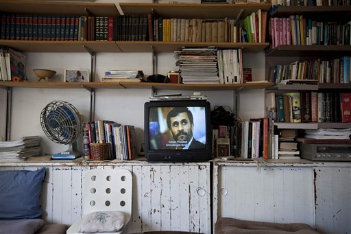 A video art work displays Iranian President Mahmoud Ahmadinejad at a gallery in Tel Aviv, Israel (AP Photo/Oded Balilty)