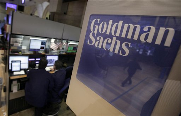 Traders work in the Goldman Sachs booth on the floor of the New York Stock Exchange Thursday, March 15, 2012 (AP Photo/Richard Drew)