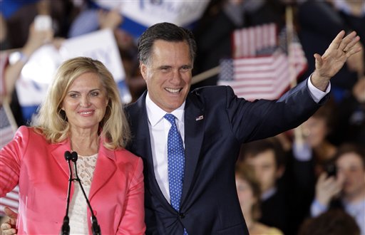 Republican presidential candidate, former Massachusetts Gov. Mitt Romney and his wife Ann wave to supporters at his Super Tuesday campaign rally in Boston, Tuesday night, March 6, 2012. (AP Photo/Stephan Savoia) (AP)