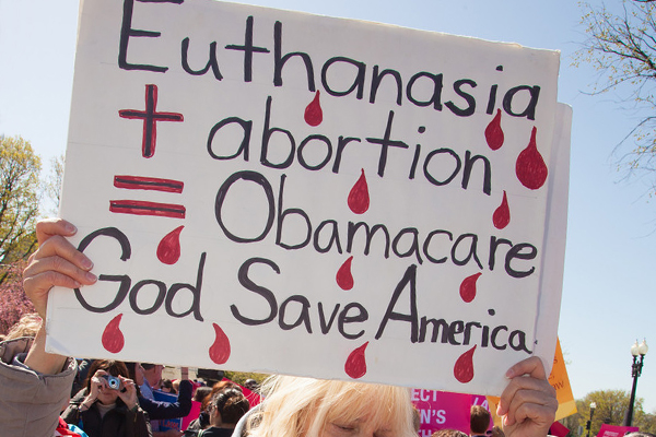 A woman protests outside the Supreme Court on Tuesday. (Jeff Malet/<a href='http://www.maletphoto.com'>MaletPhoto.com</a>)