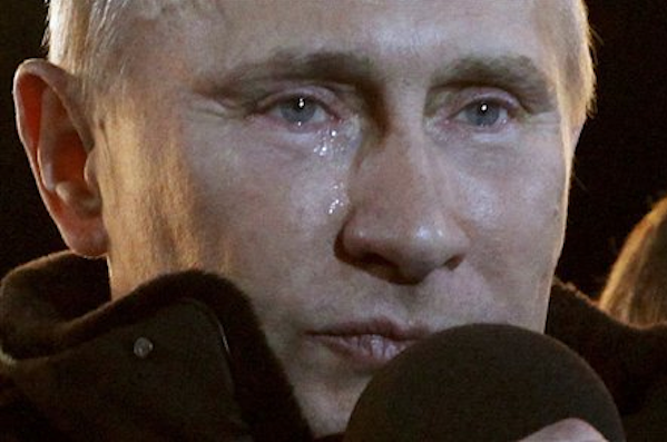 Russian Prime Minister Vladimir Putin, who claimed victory in Russia's presidential election, tears up as he reacts at a massive rally in Moscow, Sunday, March 4, 2012 (AP Photo/Ivan Sekretarev)
