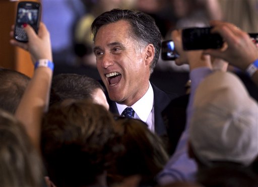 Republican presidential candidate, former Massachusetts Gov. Mitt Romney reacts while greeting supporters at a rally in Schaumburg, Ill., after the winning the Illinois Republican presidential primary, Tuesday, March 20, 2012.  (AP Photo/Steven Senne) (AP)