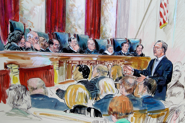 Paul Clement speaks in front of the Supreme Court in Washington on Tuesday, as the court continued hearing arguments on the health care law. (AP/Dana Verkouteren)