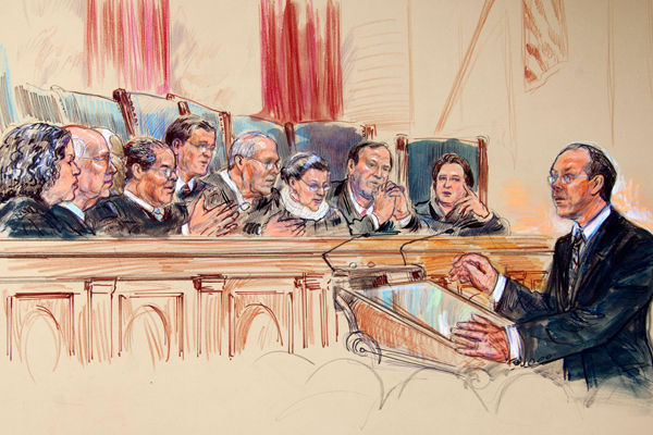 Attorney Paul Clement speaks before the Supreme Court on Wednesday. (AP/Dana Verkouteren)
