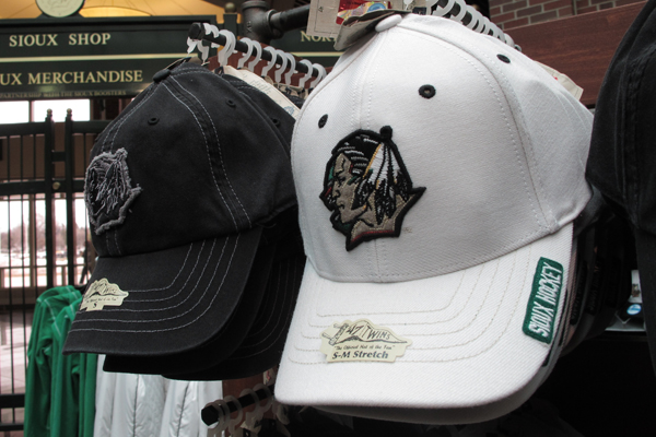 Baseball caps displaying the University of North Dakota's American Indian head logo at a souvenir shop in Grand Forks, N.D. on Monday, March 22, 2010 (AP/Dale Wetzel)