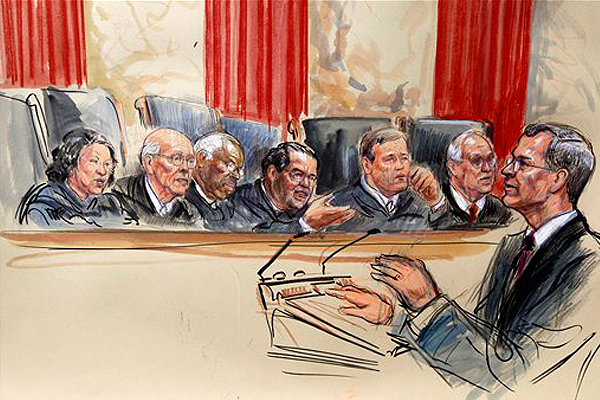 Attorney Robert A. Long speaks in front of the Supreme Court as the court began three days of arguments about the health care law signed by President Obama. (AP/Dana Verkouteren)
