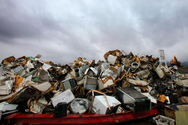 Debris left by the 2011 tsunami is piled up in Ofunato, Iwate Prefecture, northeastern Japan. Tsunami debris is now washing up on the West Coast of the U.S. (AP/Itsuo Inouye)