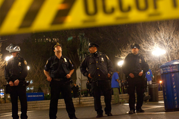 Police officers block Occupy Wall Street protesters from entering Union Square in New York. (Reuters/Andrew Kelly)