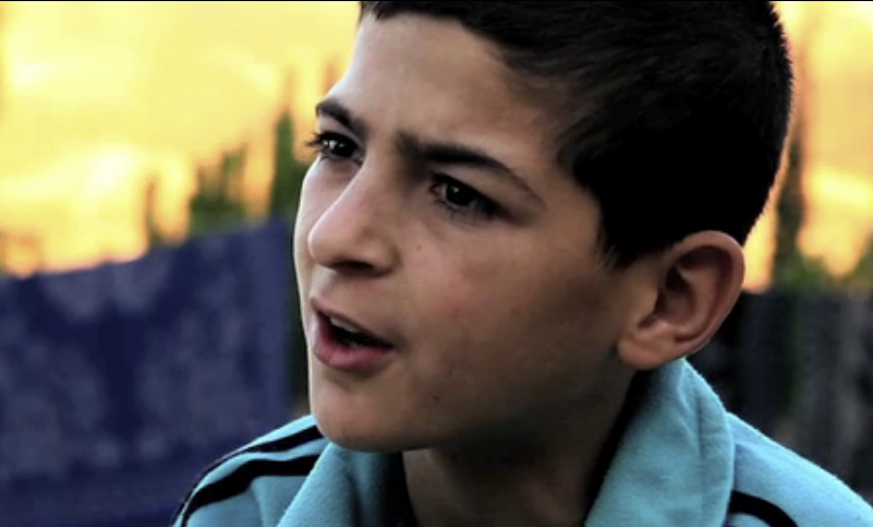 13-year-old Hossam (Screengrab from GlobalPost video)