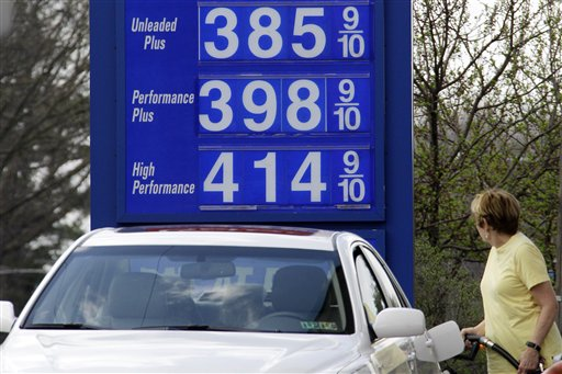 In this March 19, 2012, photo, a motorist pumps gas at a Mount Lebanon, Pa., mini-mart (AP Photo/Gene J. Puskar)