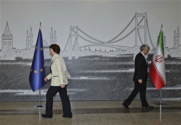 Iran's Chief Nuclear Negotiator Saeed Jalili, right, and EU Foreign Policy Chief Catherine Ashton leave after they posed for cameras before their meeting in Istanbul, Turkey, Saturday, April 14, 2012 (AP Photo/Tolga Adanali, Pool)