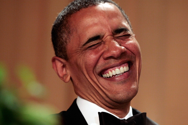 President Obama laughs at the White House Correspondents Association annual dinner in Washington on Saturday. (Reuters/Larry Downing)
