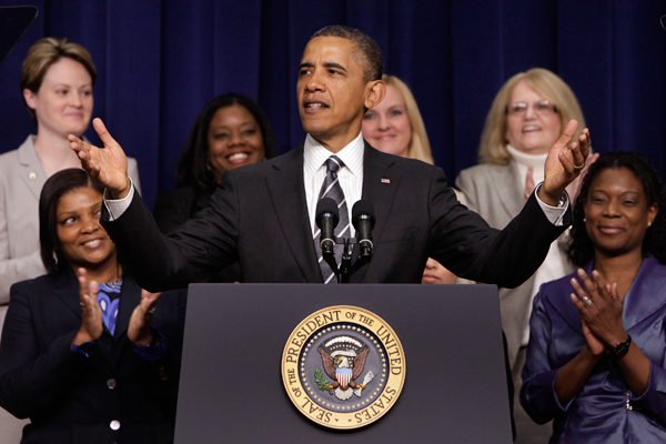 President Obama greets the audience at the White House Forum on Women and the Economy on Friday. (Reuters/Yuri Gripas)
