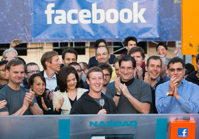 Facebook founder, Chairman and CEO Mark Zuckerberg, center, rings the Nasdaq opening bell from Facebook headquarters in Menlo Park, Calif on May 18, 2012 (AP/Zef Nikolla)