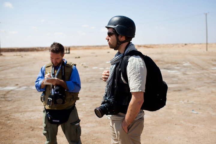 The author with his friend Chris Hondros, right, who died in Libya in 2011. (Nicole Tung)