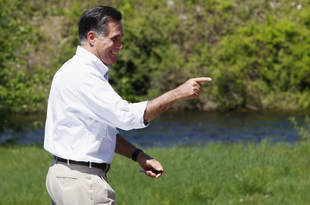 Republican presidential candidate and former Massachusetts Governor Mitt Romney gestures as he leaves a campaign event in Hillsborough, New Hampshire May 18, 2012. (Reuters/Jessica Rinaldi)