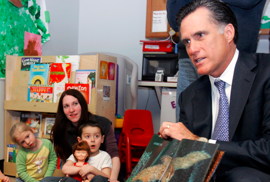 Republican presidential candidate and former Massachusetts Governor Mitt Romney reads a book to children in Manchester (Brian Snyder / Reuters)