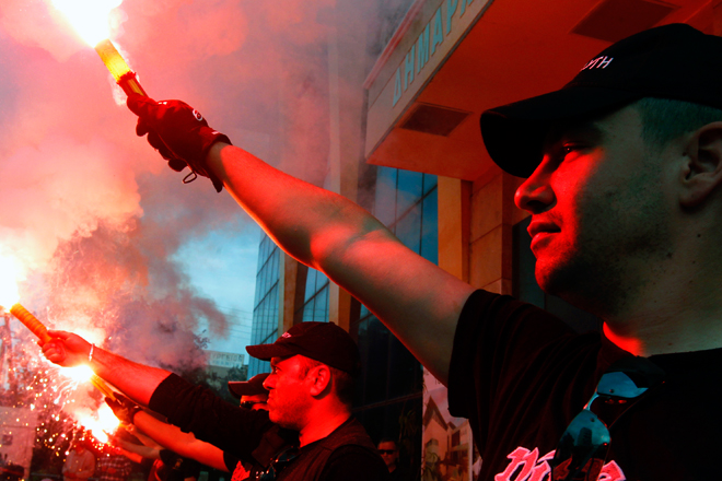 Members of the Greek extreme right Golden Dawn party hold an election rally. (Reuters/Yannis Behrakis)