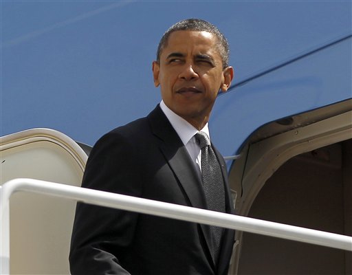 President Barack Obama prepares to board Air Force One before his departure from Andrews Air Force Base, Tuesday, May, 8, 2012. (AP Photo/Pablo Martinez Monsivais) (AP)