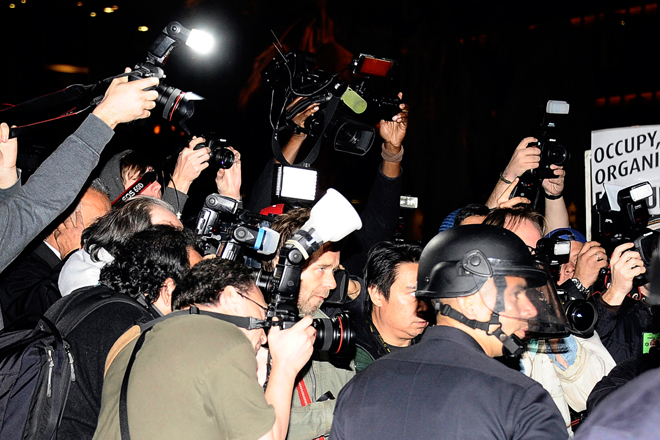 Photographers at the Occupy LA encampment in November, 2011. (Reuters/Gene Blevins)