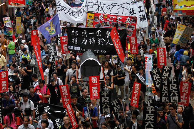 In Hong Kong, protesters take to the streets to mark the anniversary of the military crackdown on the pro-democracy protestors in Beijing's Tiananmen Square. (Reuters/Tyrone Siu)