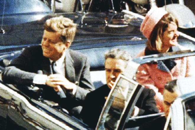 President and Mrs. Kennedy ride through Dallas moments before Kennedy was assassinated on November 22, 1963. (Reuters)