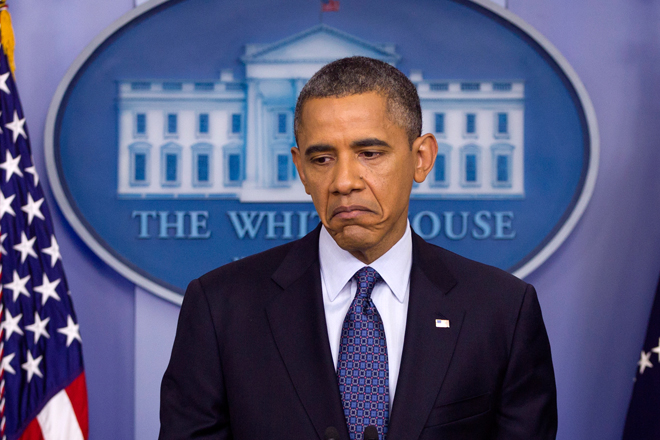 President Obama pauses while talking about the economy at the White House on Friday. (AP/Carolyn Kaster)