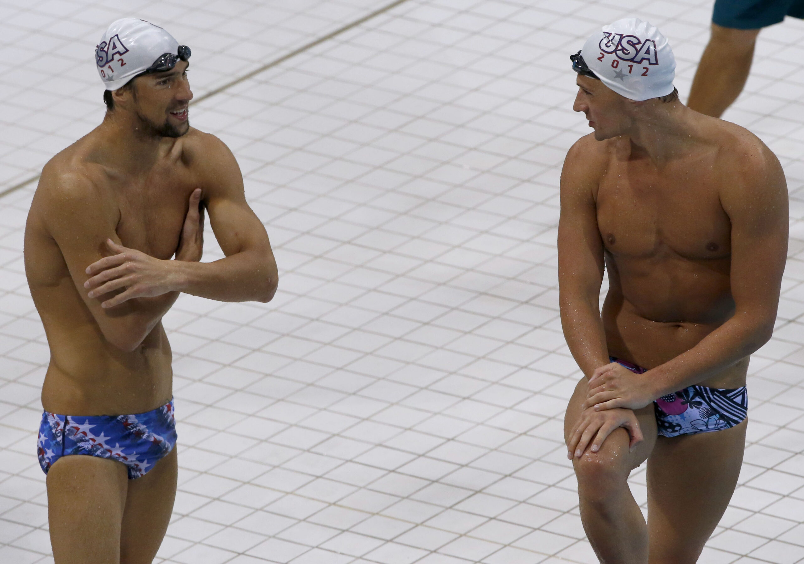 Michael Phelps (L) and Ryan Lochte during a training session (Reuters)