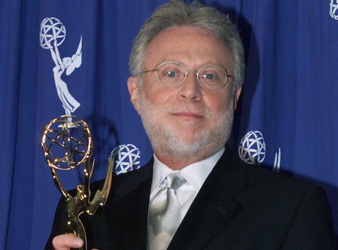 Television newsman Wolf Blitzer of CNN poses with the Governors Award presented to CNN at the Creative Arts Emmy Awards, September 8, 2001 in Pasadena. (Reuters/Fred Prouser)