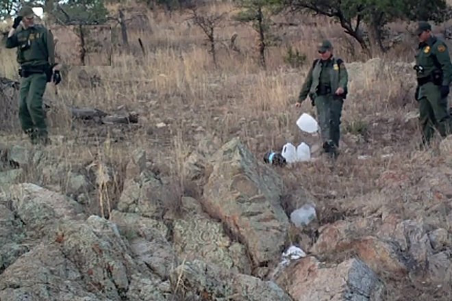 A hidden camera set up by the group No More Deaths shows Border Patrol agents destroying water left in the desert for migrants to drink. The video will be broadcast tonight on the PBS show "Need to Know."