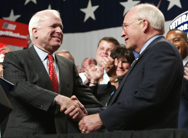 Sen. John McCain, R-Ariz., left, shakes hands with Vice President Dick Cheney after McCain introduced Cheney during a campaign stop, Friday, July 16, 2004, at the Lansing Center in Lansing, Mich. (AP Photo/Al Goldis)