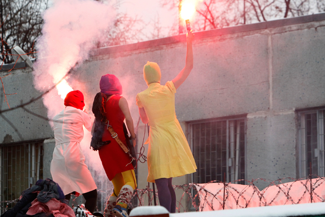 Members of the Russian radical feminist group Pussy Riot stage a performance to support detained opposition activists. (Reuters/Denis Sinyakov)