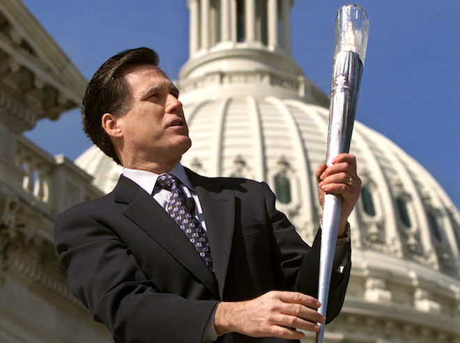 Mitt Romney unveils the Olympic Torch for the 2002 Olympic Winter Games on Feb. 21, 2001. (Reuters/Kevin Lamarque)