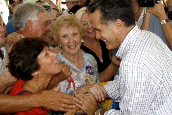 Mitt Romney greets supporters at a campaign rally in The Villages, Fla. (AP/Joe Kaleita)