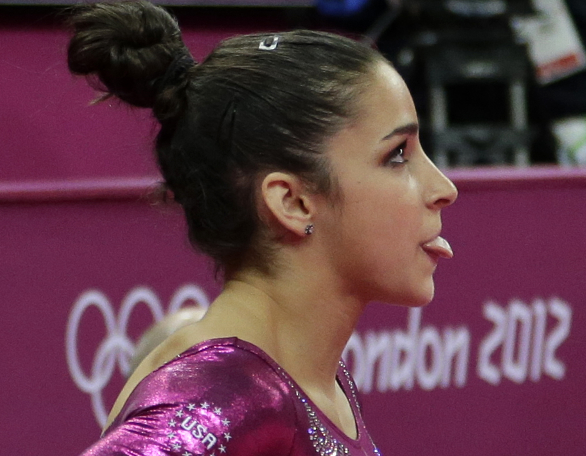 Raisman awaits the scores to be posted (AP/Gregory Bull)