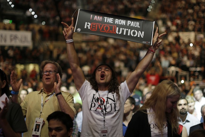 Supporters of Rep. Ron Paul, R-Texas, rally at the University of South Florida Sun Dome on the sidelines of the Republican National Convention in Tampa, Fla., on Sunday, Aug. 26, 2012. (AP Photo/Charles Dharapak) (AP/Charles Dharapak)