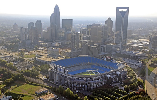 Bank of America Stadium is shown by the skyline of downtown Charlotte, N.C., Thursday, Aug. 16, 2012. The stadium is one of the sites of the Democratic National Convention. The convention starts on Sept. 3, 2012. (AP/Chuck Burton)