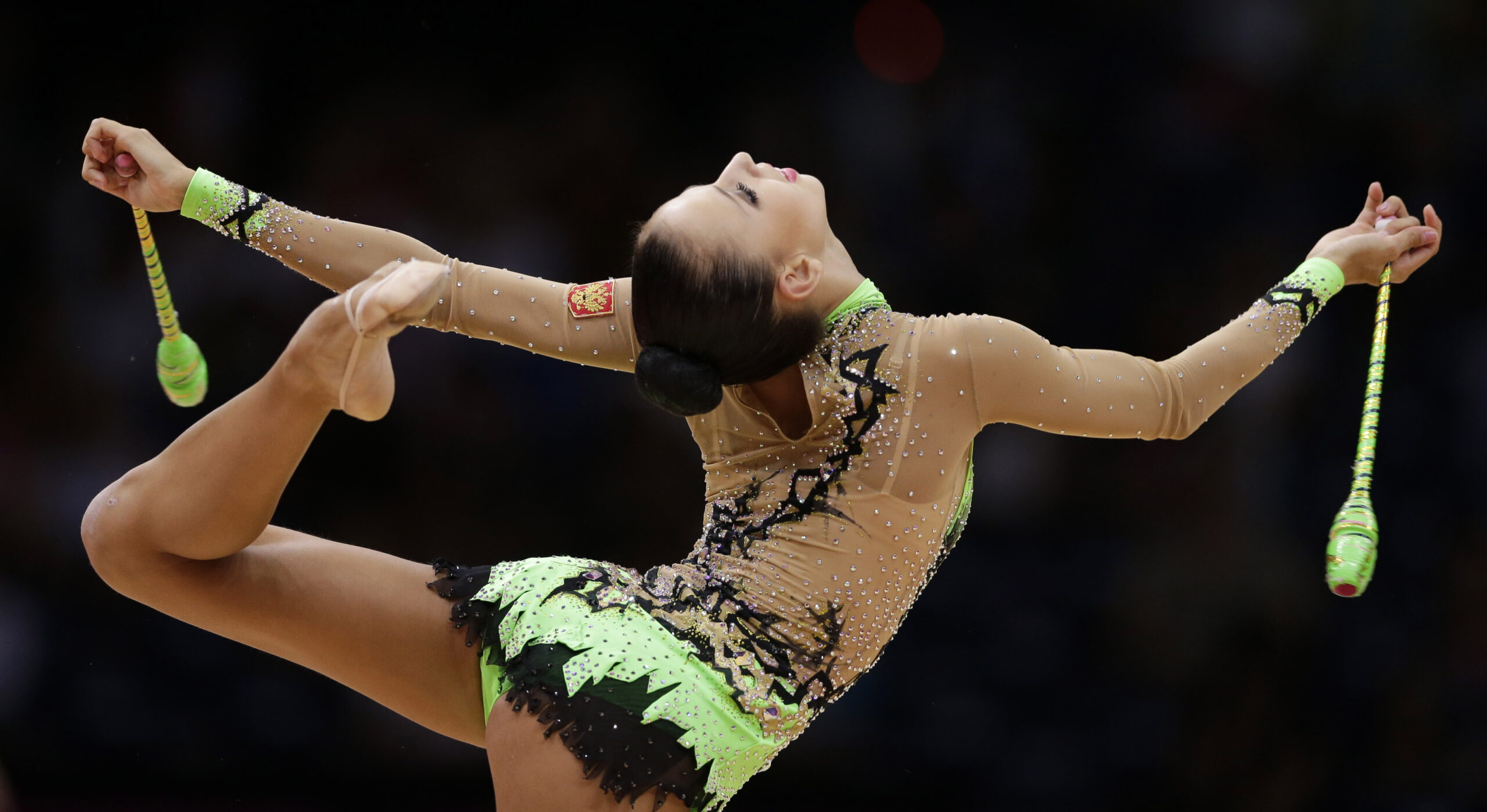 Russia's Daria Dmitrieva during the rhythmic gymnastics individual all-around qualifications at the 2012 Summer Olympics. (AP/Gregory Bull)