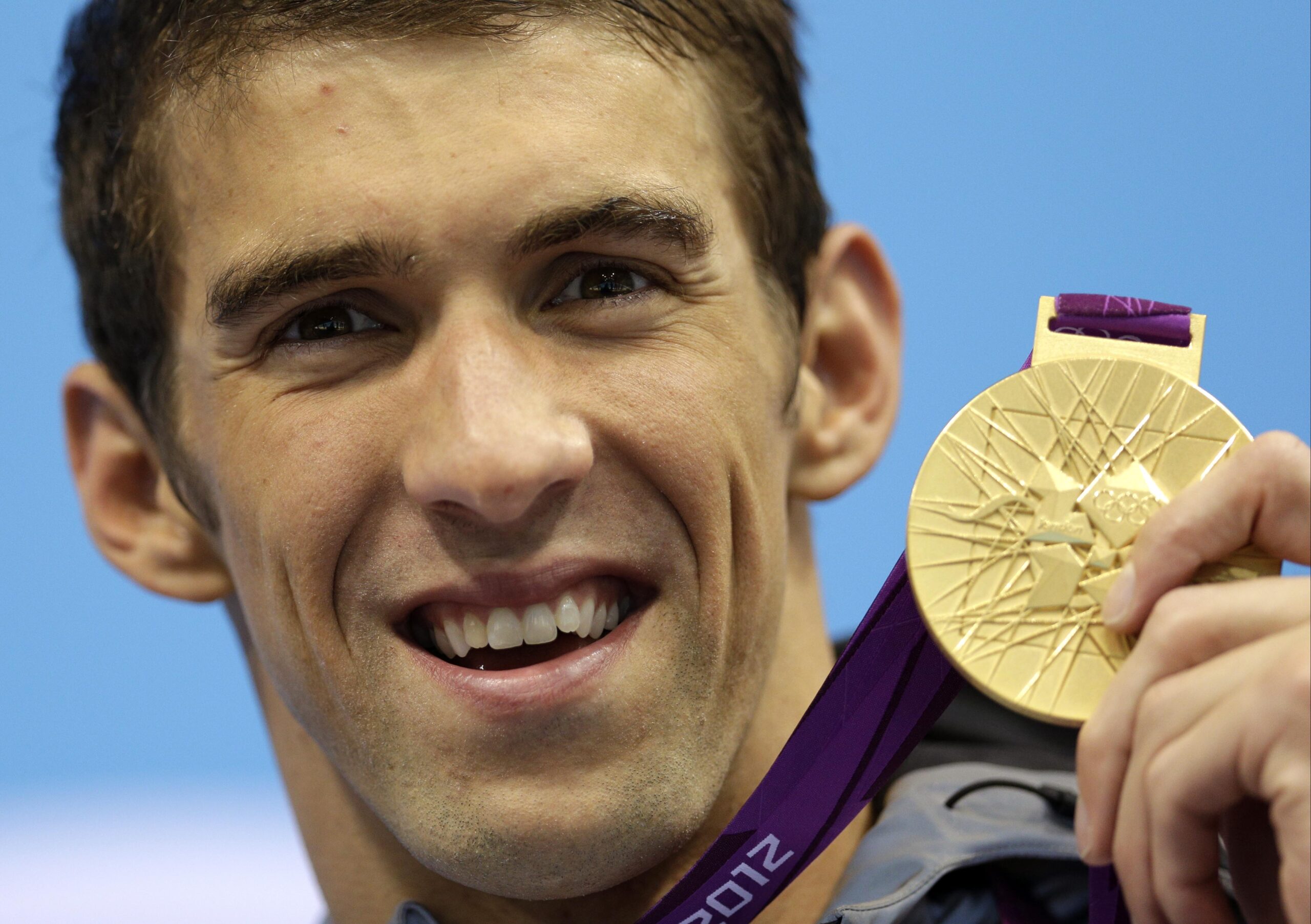 Michael Phelps won his record 19th medal Tuesday in the 4x200 freestyle relay. (Michael Sohn)